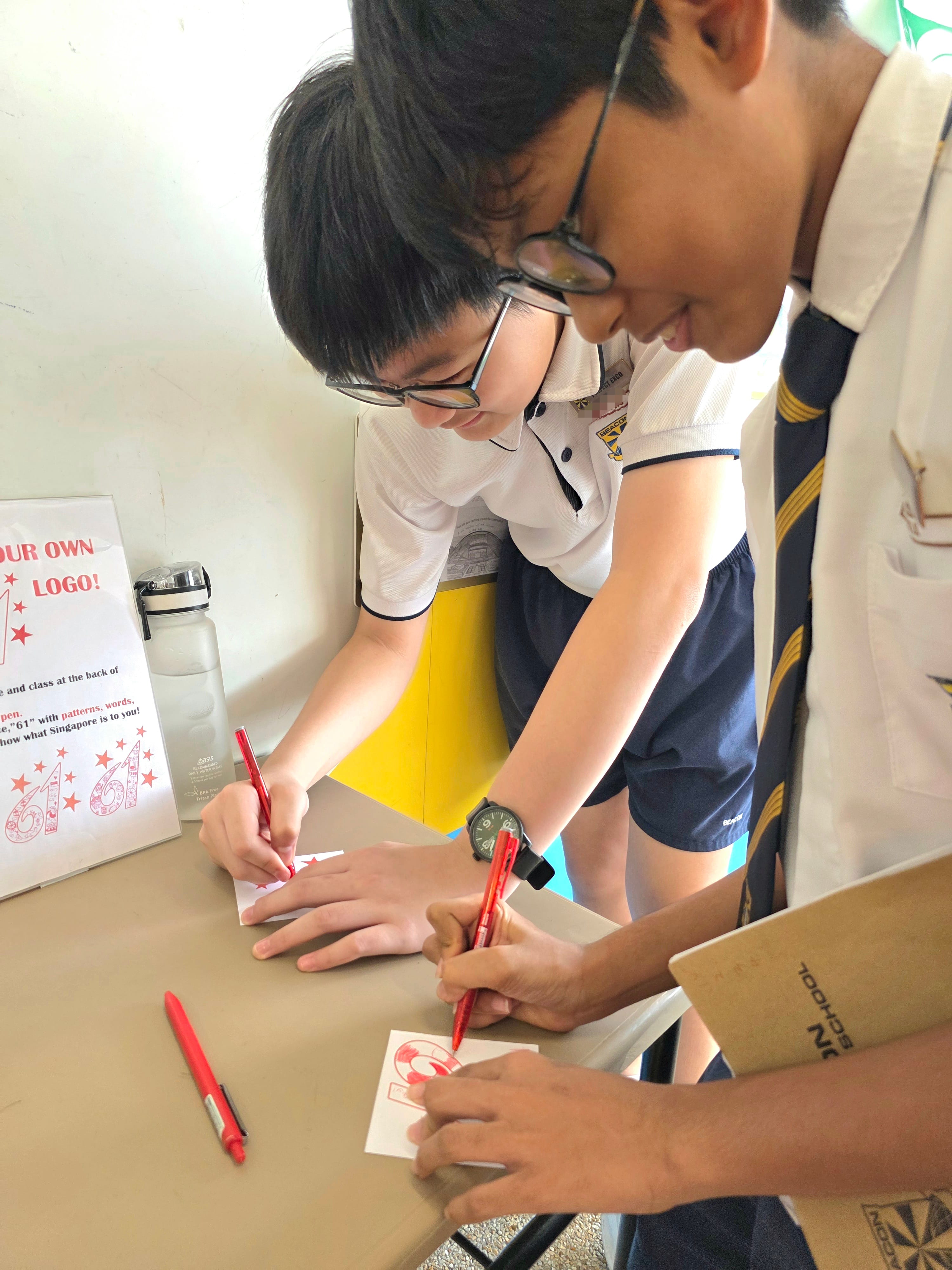 🎨 Leaving Our Mark: Our creative Beacon students contributed to the school's collaborative art installation by uniquely designing the inner panels of this year's National Day logo!